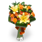lilies, gerberas and orange roses