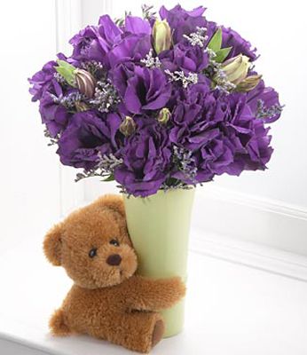 blue flowers with teddy bear
